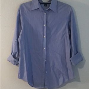 Light blue button down shirt.